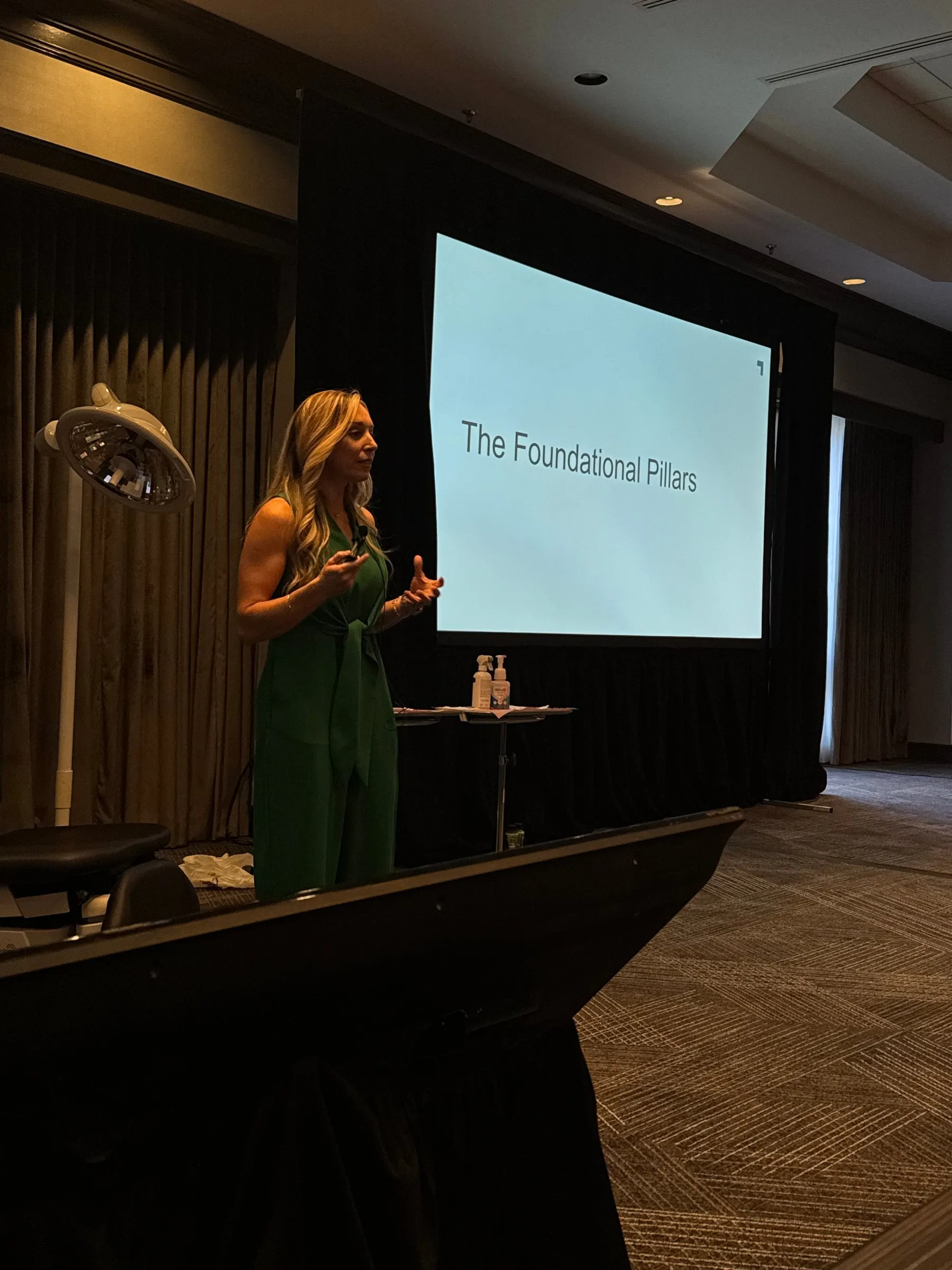 Dr. Amanda Hill speaking at a medical conference