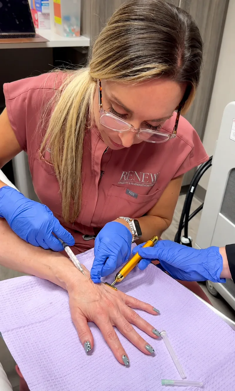 Dr. Amanda Hill administering a biostimulator treatment at RENEW
